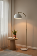 Nordic Arc Floor Lamp styled in a minimalist modern living room corner with warm ambient lighting